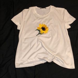 white shirt with embroidered details